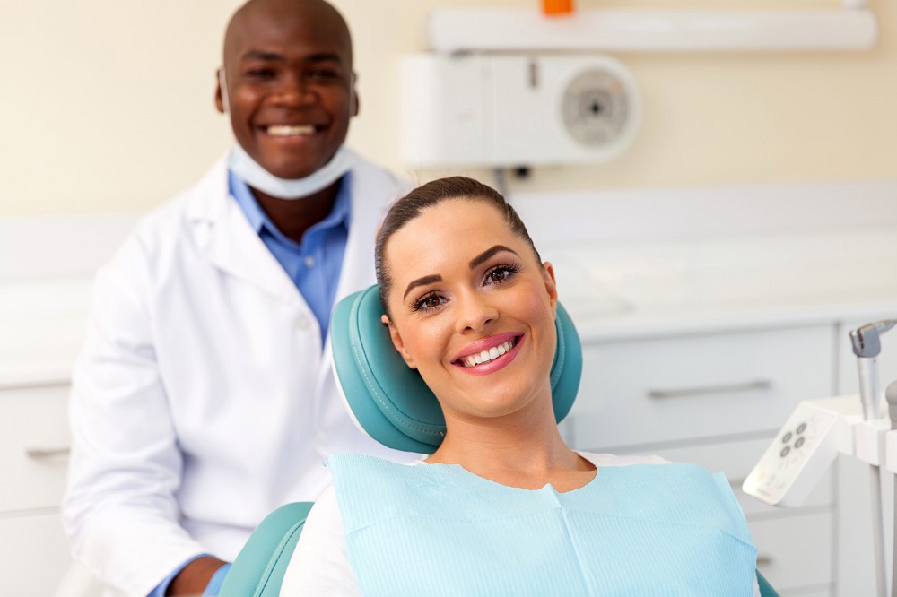 woman smiling after professional teeth cleaning