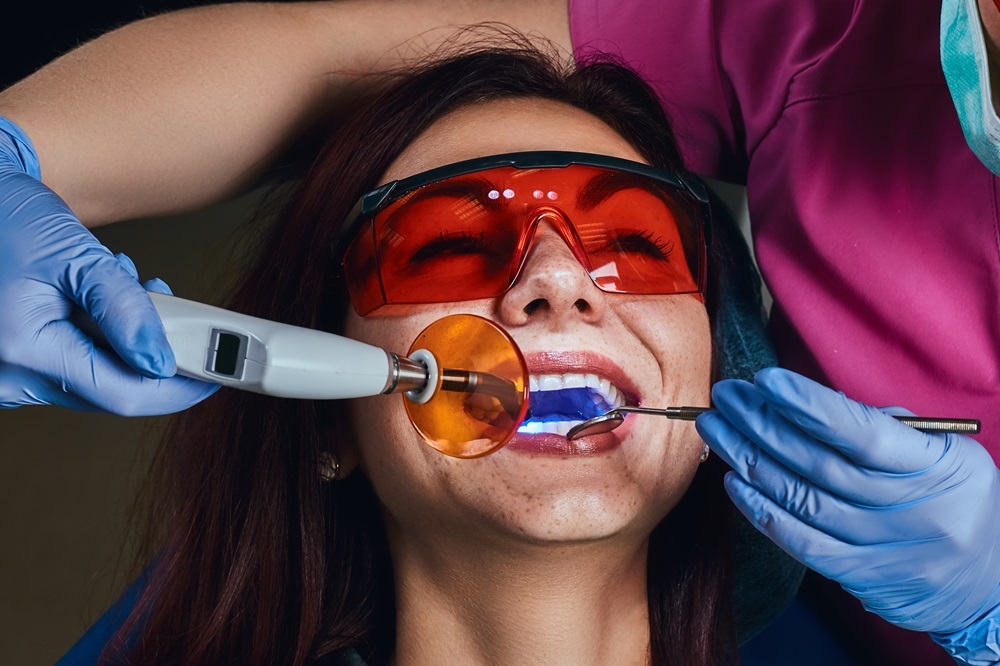 woman taking zoom teeth whitening treatment